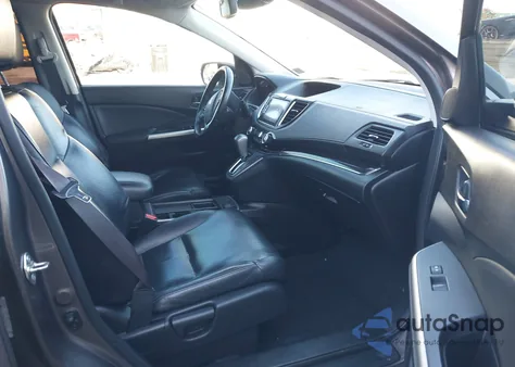 2015 Honda Cr-V Touring z USA, uszkodzony, nr VIN 5J6RM4H90FL090130